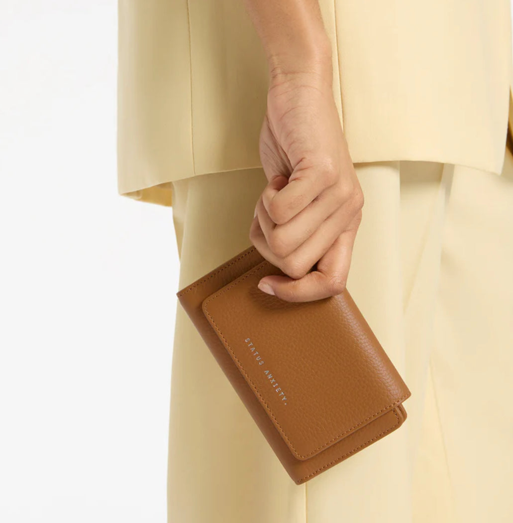 Visions - Camel Wallet Status Anxiety