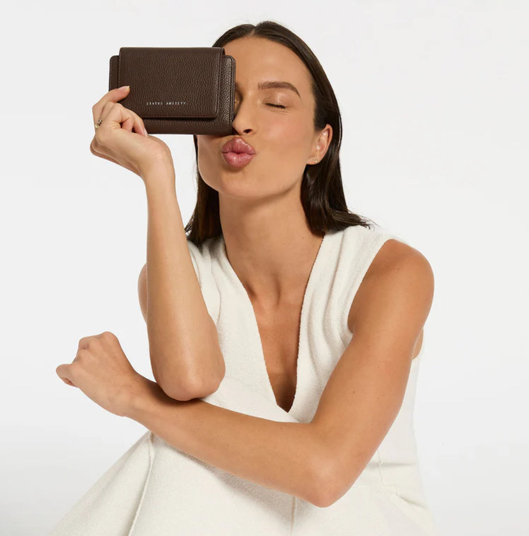 Visions - Cocoa Wallet Status Anxiety