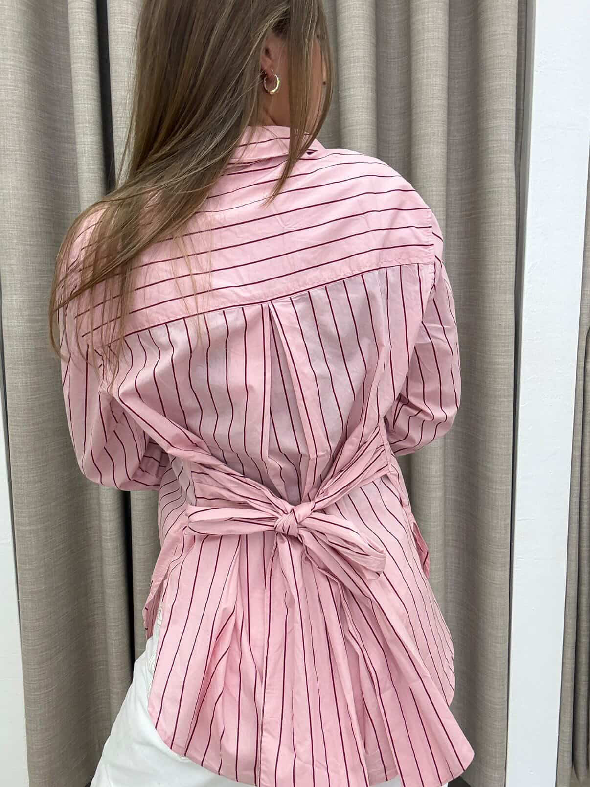 White closet pink stripe shirt